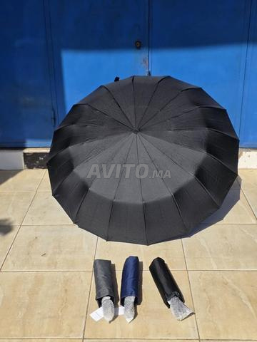 Parapluie noir pratique et neuf. - 2