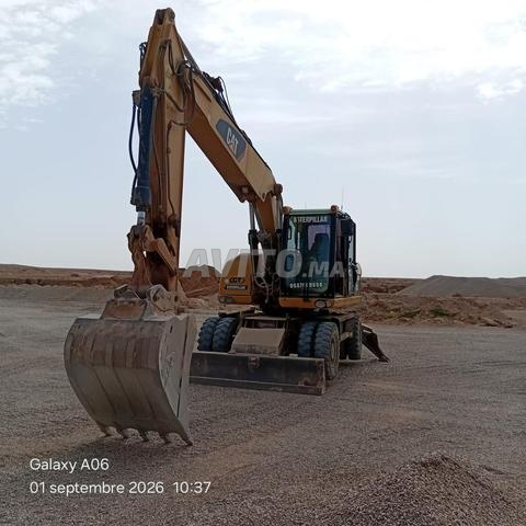 بيع حفار على عجلات - 2
