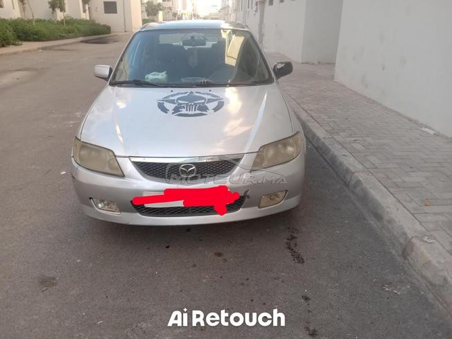 Mazda 323 Essence 
