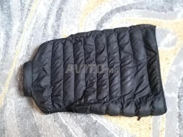 Gilet noir doublé tendance en excellent état - 2