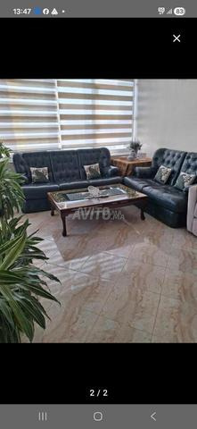 Fauteuil en cuir avec une table - 2