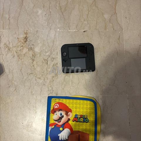 Nintendo 2DS avec jeux chargeur et pochette - 2