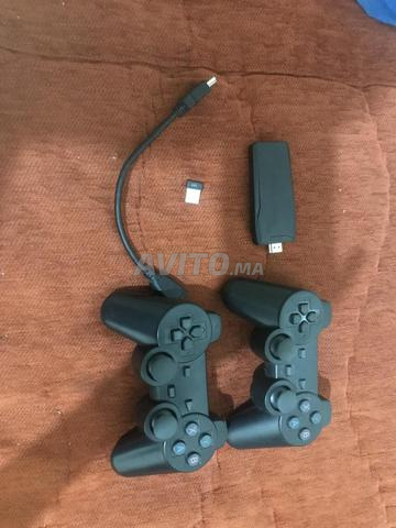 Game Stick Lite 4k مع جهاز ألعاب