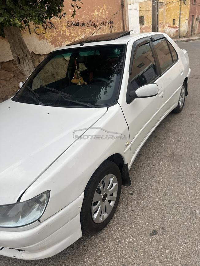 بيجو 306 اصانص نص عمارة  ضريبة 650 2001