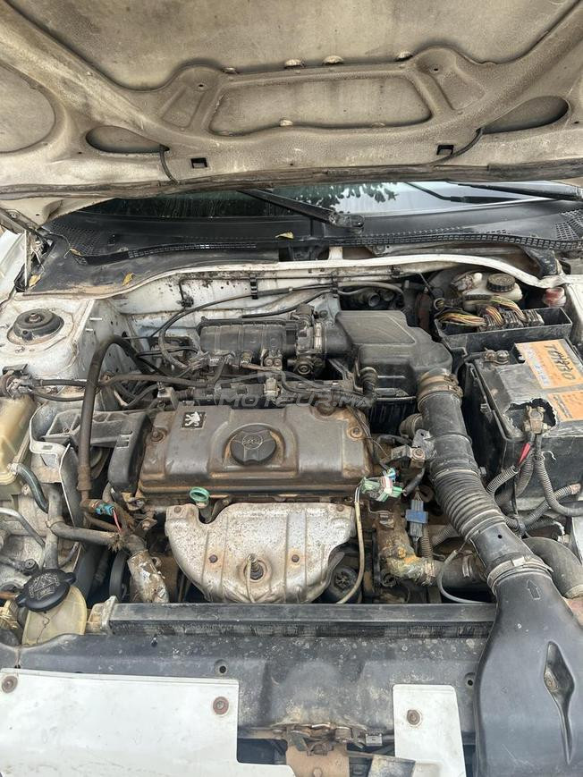 بيجو 306 اصانص نص عمارة  ضريبة 650 2001
