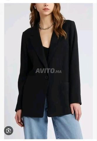 Blazer noir H&M — Taille EU 34 (XS).