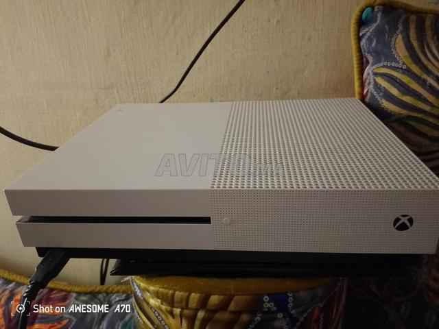 Xbox one s / 1000 جيجا، جديد وأداء جيد جداً.