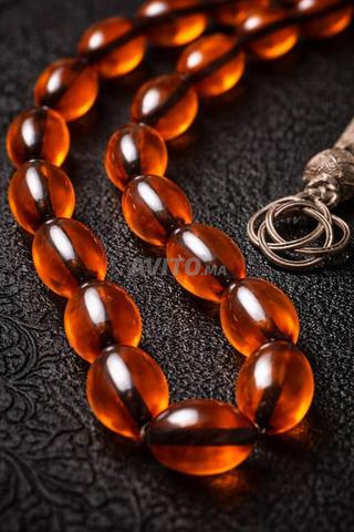 مسبحة فارسية من الكهرمان الناري تحمل شرابة فضة - 2