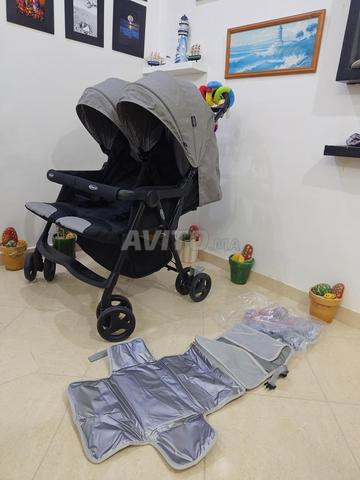 عربة أطفال توأم توام كالجديدة - 2