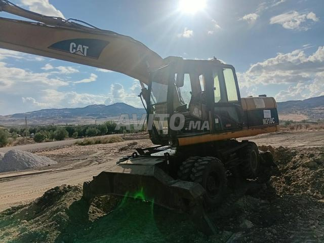 بوكلين كات M318C - 2