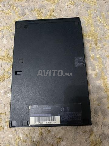 ps2 slim plus 2 jeux dvd - 2