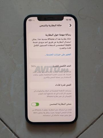 iPhone 12 normal, Face ID fonctionnel, état 74%, stockage 64 - 2