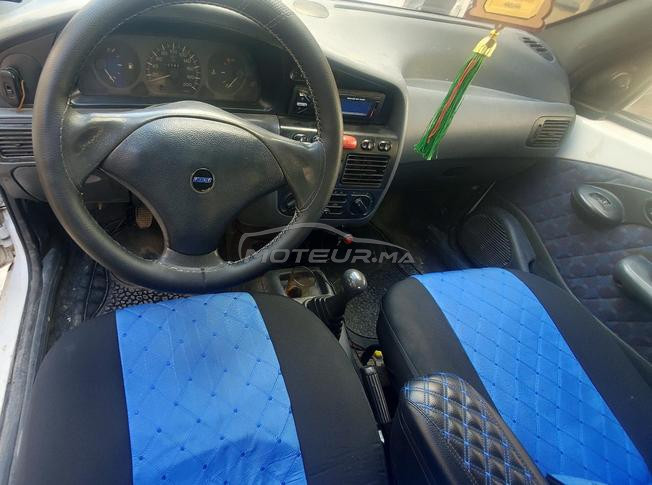 tomobil n9ya li bra yksab mrhba cart gris fsmiti
