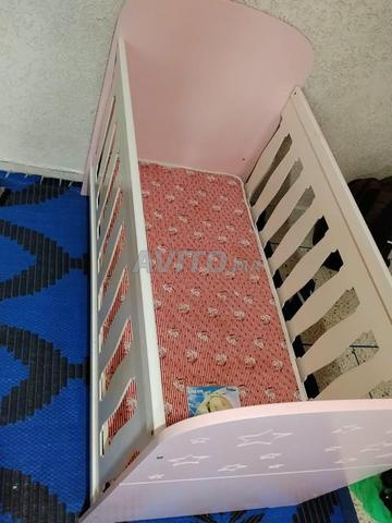 سرير أطفال قابل للفك