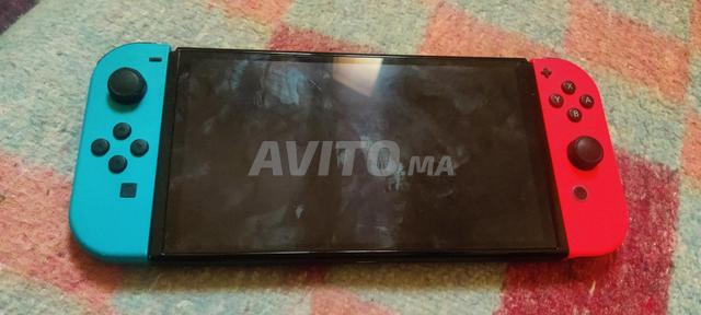 Nintendo Switch OLED قطعة - 2