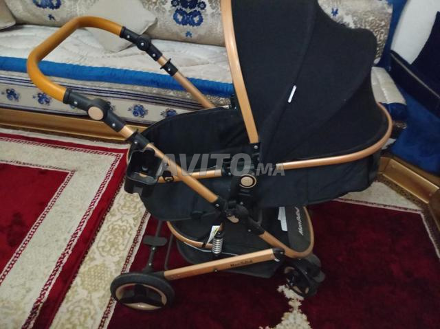 عربة أطفال ماركة مون بيبي