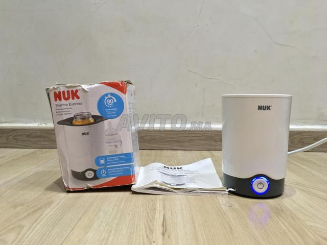 سخان رضاعات مع عبوة ماركة Nuk