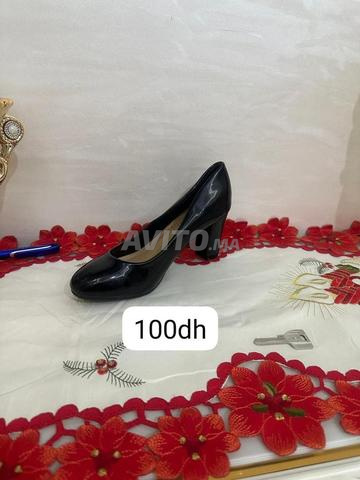 Vêtements et chaussures en parfait état - 2