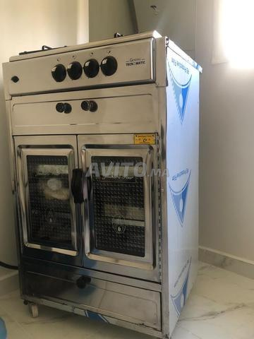 Cuisinière 4 feux avec four comme neuf - 2
