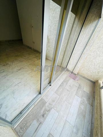 Bâtiment partagé Appartement et local commercial - 2