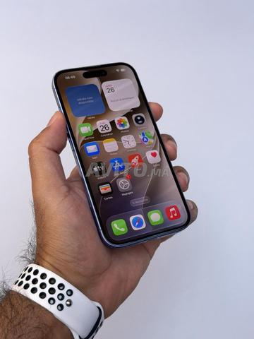 iPhone 16 bleu 128Go 90 officiel - 2