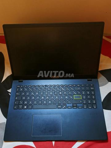 جهاز كمبيوتر محمول ASUS - 2