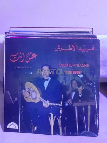 lot de 4 vinyles 33 tours très bonne qualité