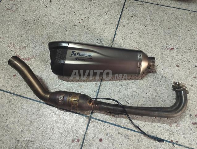 عادم أكربوفيتش TMAX