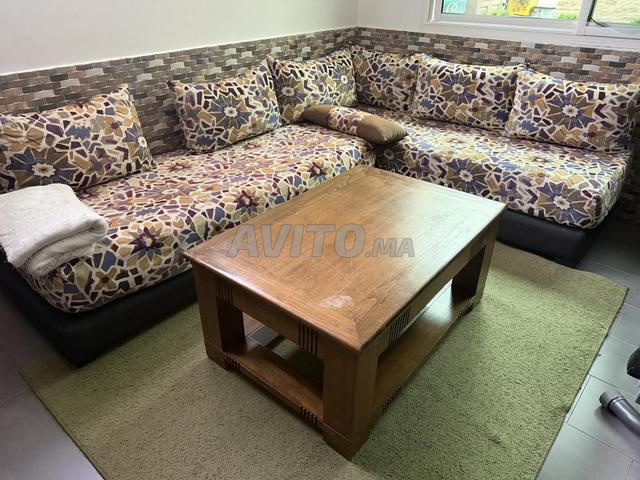 Salon en L avec tapis