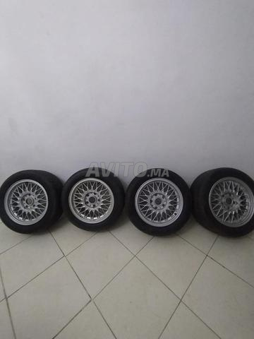 طقم من 4 جنوط 15 بوصة مع إطارات 205/55 R15