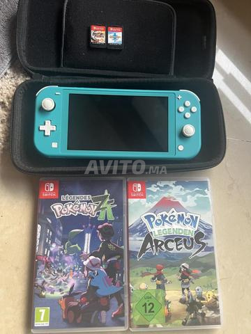 جهاز Nintendo Switch Lite تركوازي مع 4 ألعاب وغلاف
