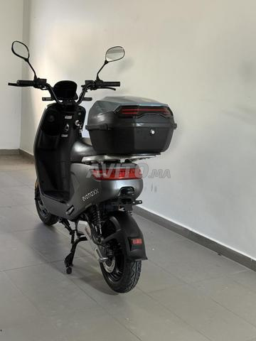 Moto électrique très bon état