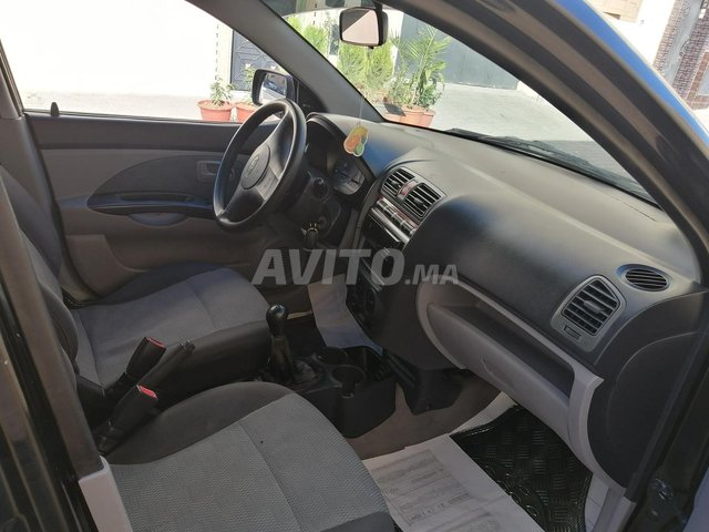 Voiture Kia Rio 2006 à rabat Hybride - 5 chevaux