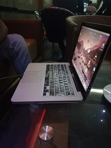 Macbook Pro Touch Bar 15 Inch li mhtem mrhba - 1