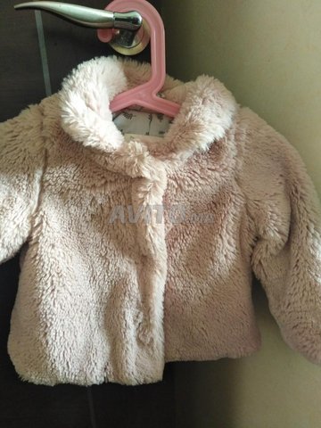 Manteau pour un bébé fille - 1
