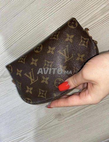 Pochette Femme Louis Vuitton  Sacs et Accessoires à Casablanca