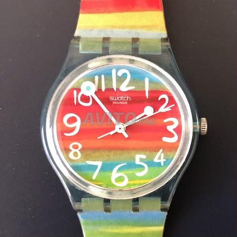 Montre femme SWATCH arc en ciel tanche Montres et Bijoux