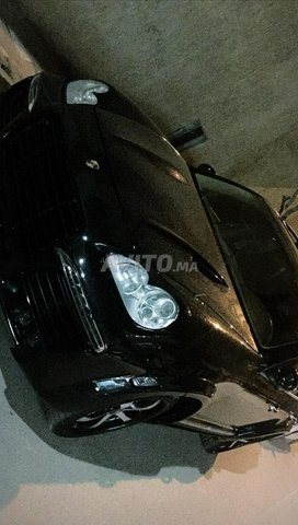 Voiture Porsche Cayenne 2009 à meknès Essence - 15 chevaux