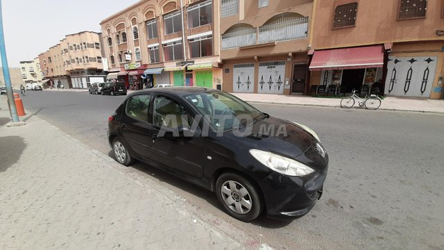 Voiture Peugeot 206 2013 à tiznit Essence - 4 chevaux