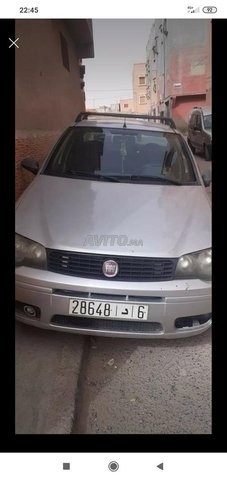 Voiture Fiat Albea 2010 à guelmim Essence - 8 chevaux